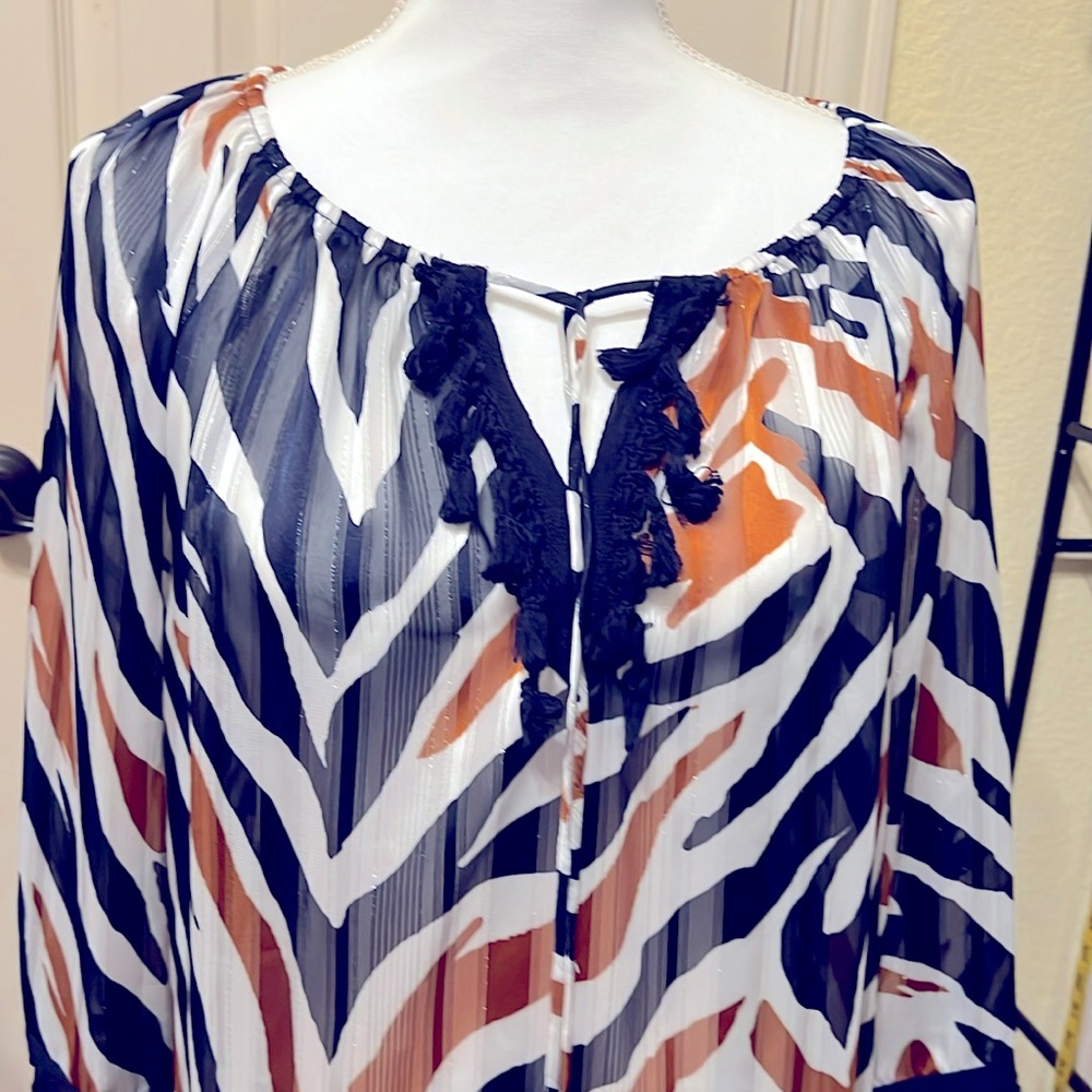 Sheer animal print tie neck tassel top by Dennis Basso. Size 12. Never worn.